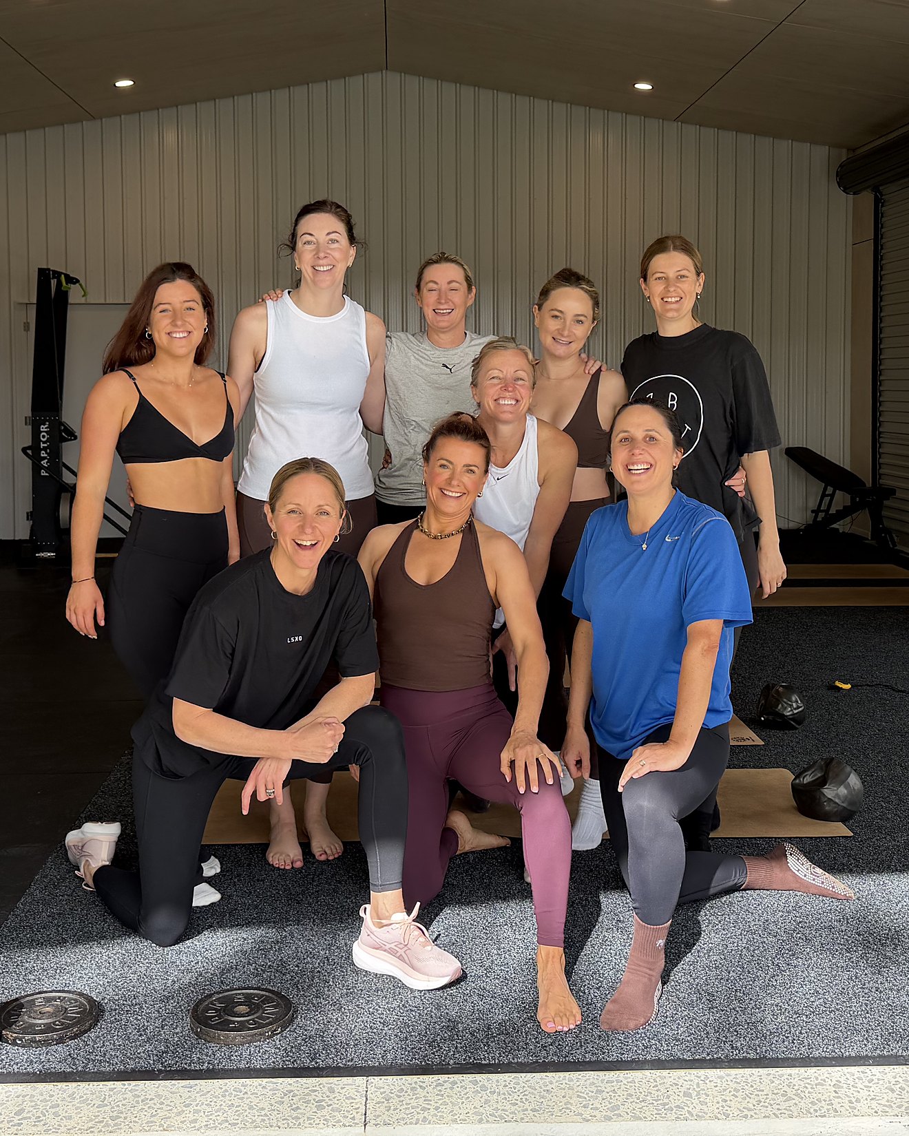 The Fit Shed crew inside the shed. Kate is front left, in black